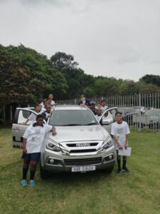 CMH Umhlanga- Kids with a silver Isuzu MUX